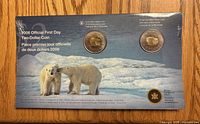 Front of sealed card with two 2006 $2 coins showing polar bear reverse