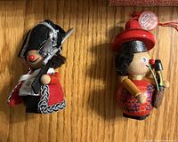 Front view of both wooden ornaments