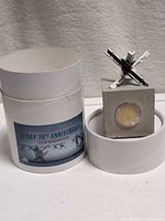 Complete set with presentation tube, concrete block, coin and hedgehog sculpture