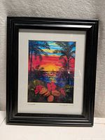 Framed tropical sunset numbered signed print in black frame
