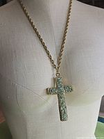 Full view of necklace on display form showing size and chain
