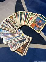 Stack of loose 1988 Topps cards fanned out showing fronts