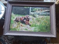 Framed painting showing full view including frame