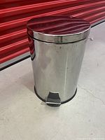 Full view of stainless steel trash can closed