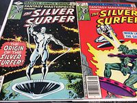 Front covers of The Silver Surfer first and second issues showing detailed artwork and titles.