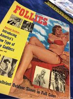 Magazine front cover showing woman in red bikini with text describing Follies featuring outdoor sirens in full color and special section