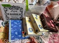 Group shot of all six albums showing colours and designs