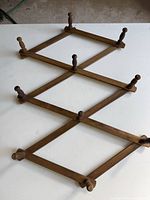 Rack fully expanded showing lattice structure and pegs