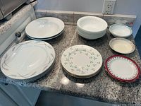 Countertop view of all plates and bowls grouped