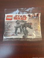 Front of sealed polybag showing set details