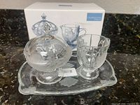 Complete set on counter with box in background