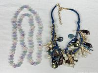 Both necklaces side by side for overall view