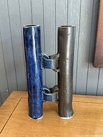 Front view showing blue and brown cylinders joined