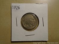 Obverse side showing Native American profile and date 1926.