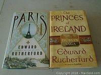 Front covers of two hardcover novels by Edward Rutherfurd: "Paris" and "The Princes of Ireland: The Dublin Saga".
