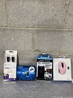 Group shot of all four sealed items: HDMI cable, endoscope camera, outdoor timer, wireless mouse