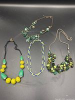 All four necklaces laid out for full lot overview
