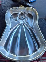 Front of princess dress pan showing molded design