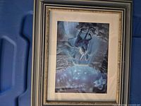 Front view showing print, mat, and frame