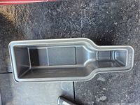 Top view of bottle-shaped non-stick cake pan showing interior and finish