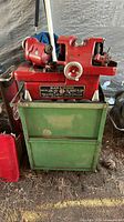 Front view of valve refacer on cabinet