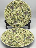 Front view of both yellow Famille Rose plates