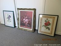 All three framed floral prints side by side