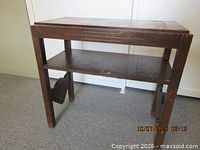 Front angled view of entire table showing shelf and legs