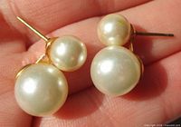 Front view showing stacked faux pearls and gold-tone posts