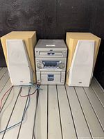 Front view of JVC FS-P7 console and both speakers showing overall condition