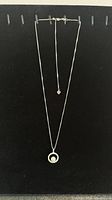 Full view of necklace on display board