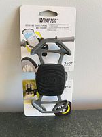Front of sealed Nite Ize Wraptor smartphone bar mount showing branding and product details