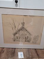 Full view of framed pencil drawing