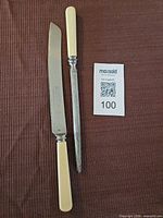 Bread knife and honing steel full view
