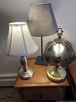 Three table lamps grouped together showing overall styles and relative sizes