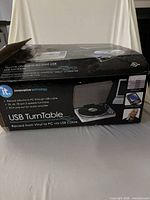 Retail box showing Innovative Technology USB Turntable graphics and specs
