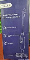 Retail box showing product image and specs (15 s heating, 550 ml tank, 5 m cable)