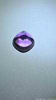 Sugarloaf cut purple amethyst front view