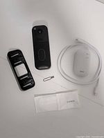 Blink doorbell, bracket, sync module, USB cable, hardware pack, tool displayed