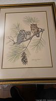 Full view of framed owl print showing mat and frame