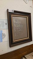 Full framed artwork with certificate and plaque