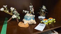 Shelf view showing all figurines and turtles