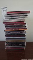 Full stack of CDs showing overall quantity