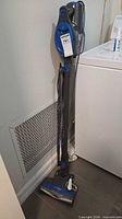 Full view of Shark Rocket vacuum standing upright