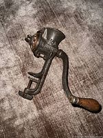 Full view of cast iron No.3 New Standard food chopper with clamp and crank handle