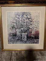 Front view of framed print showing artwork, mats, gold frame