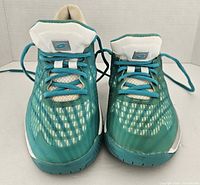 Front view of pair showing uppers, laces, toe boxes