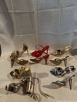 Group shot of all seven pairs showing finishes and heel types