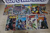All nine comics in two rows, bagged and boarded