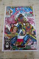 Front cover showing title, issue number, characters Bishop, Storm & others